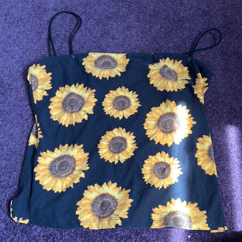 tank top from rue 21 never worn. it’s a XL